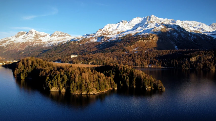 a scenic view of the mountains and lake