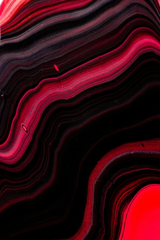 a red object that looks like a wave
