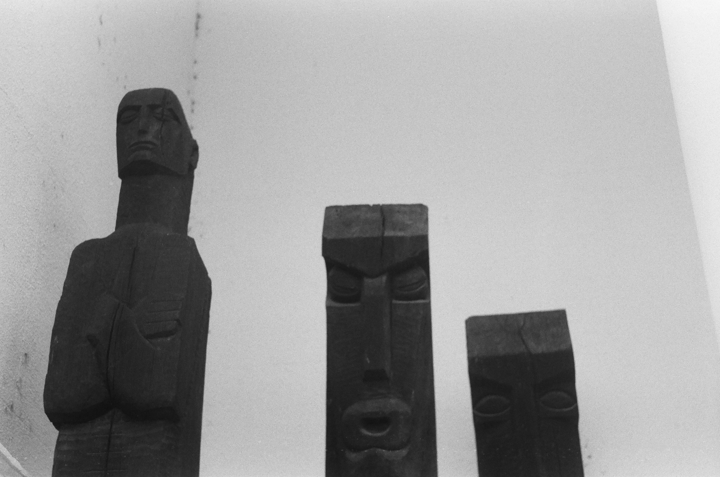 a black and white po of two large sculptures