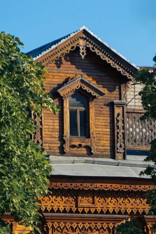 a building that has an open window on top