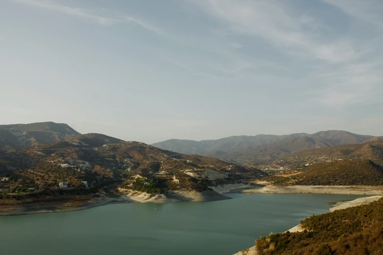 there is a blue lake in the mountains