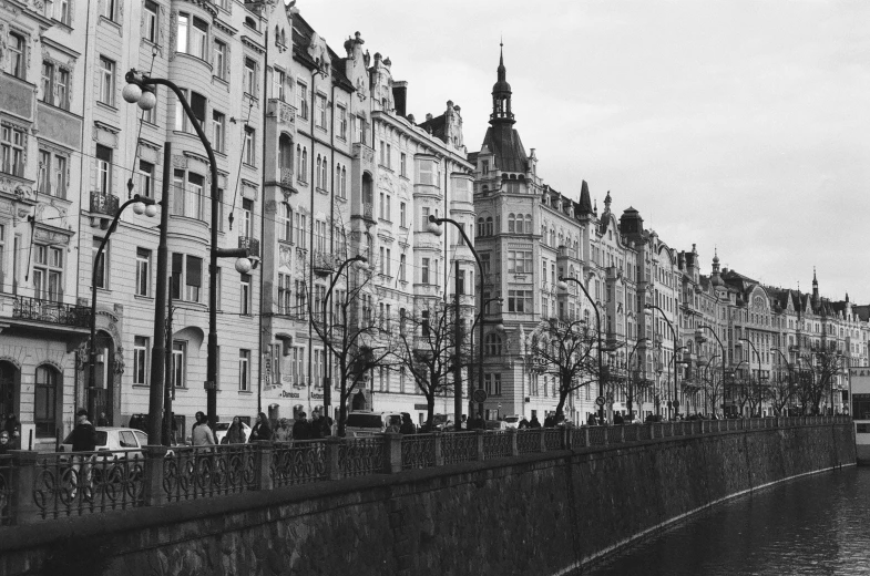 a black and white po of some buildings and a bus