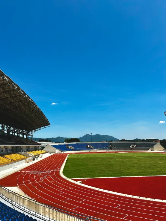 an olympic stadium with the seats empty