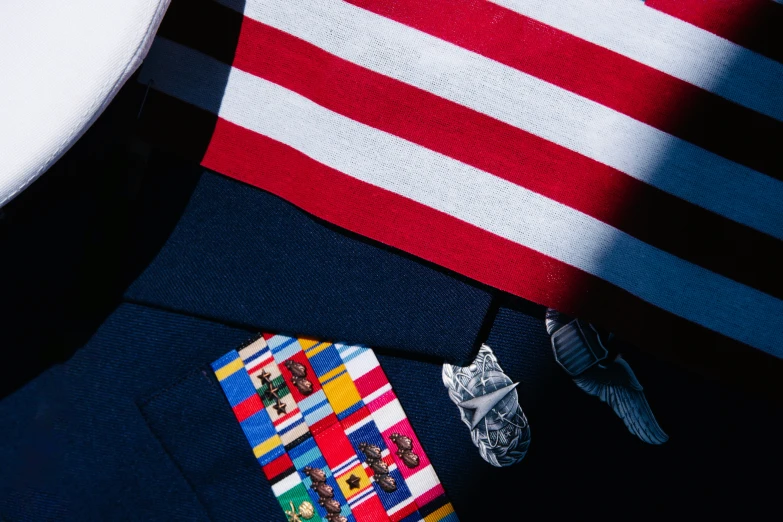 a uniform is shown with a colorful tie