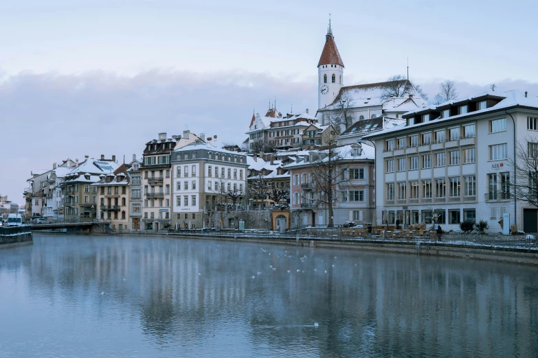 a body of water surrounded by tall buildings