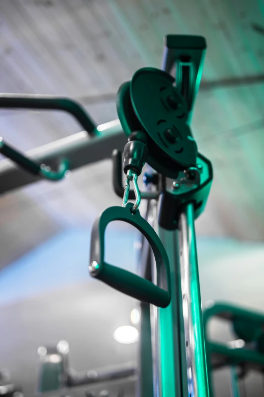 a large metal rack holding several small green objects