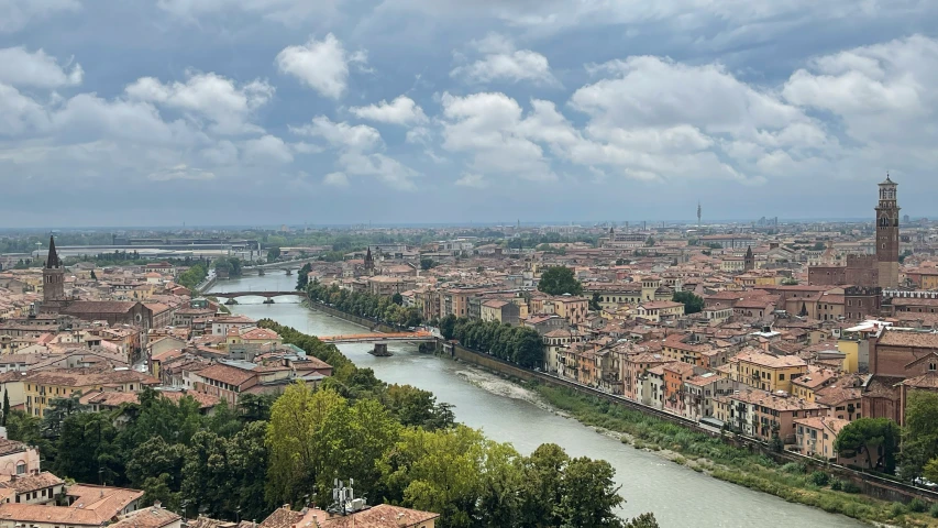 the city is surrounded by old buildings and is situated near a river