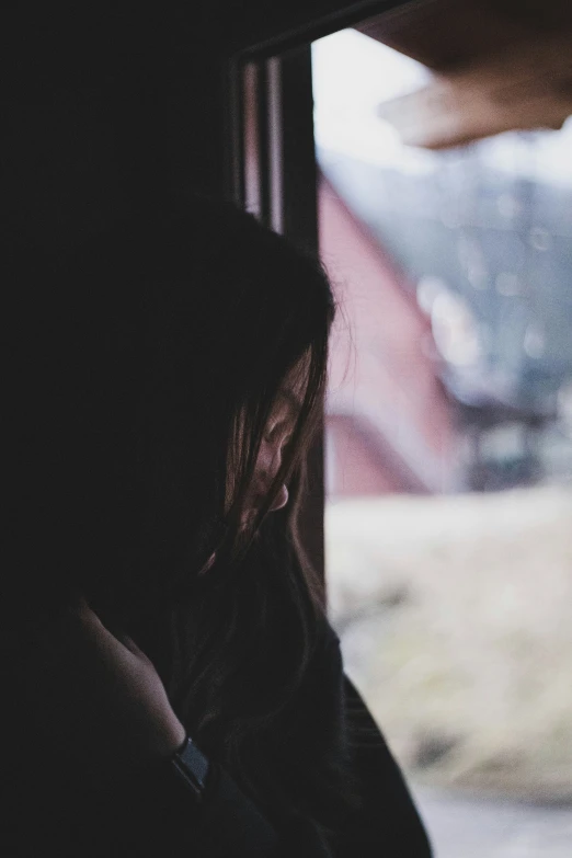 a man looking out the window in his vehicle