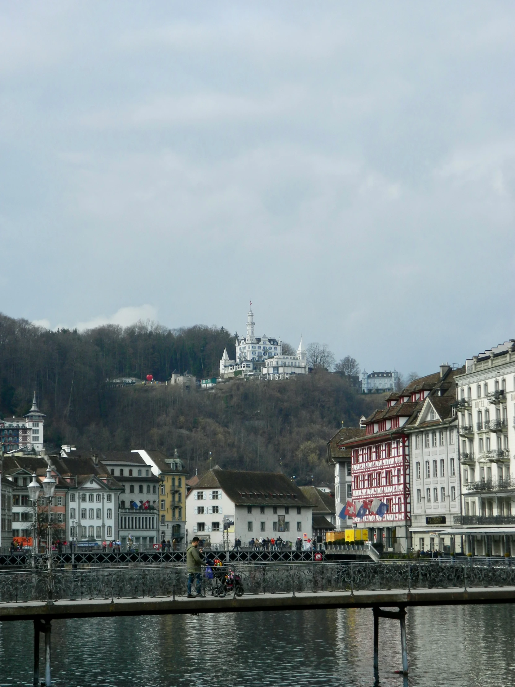 buildings line the water along side a river