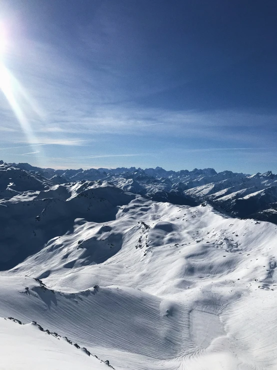 a person is standing on a ski slope