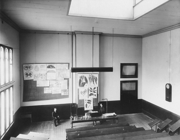 this room features a large wooden desk and chair