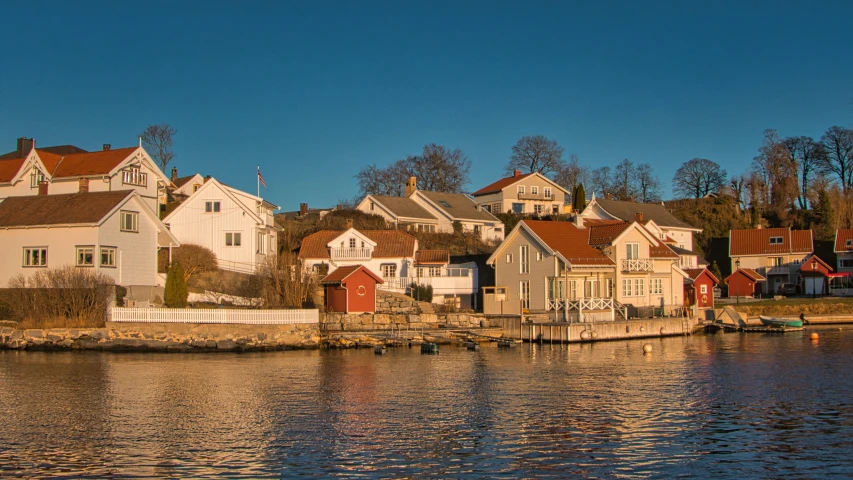 a harbor that has many houses on the shore