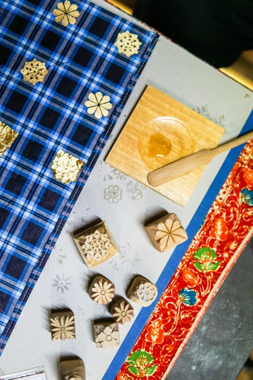 a close up view of the  board with some scissors and food