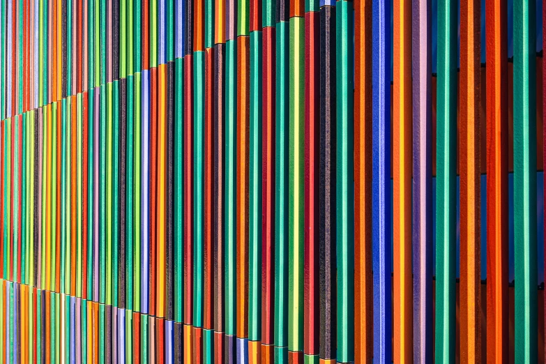 many colored lines of various colors on the wall