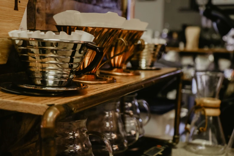 wine glasses and a basket sitting on a table