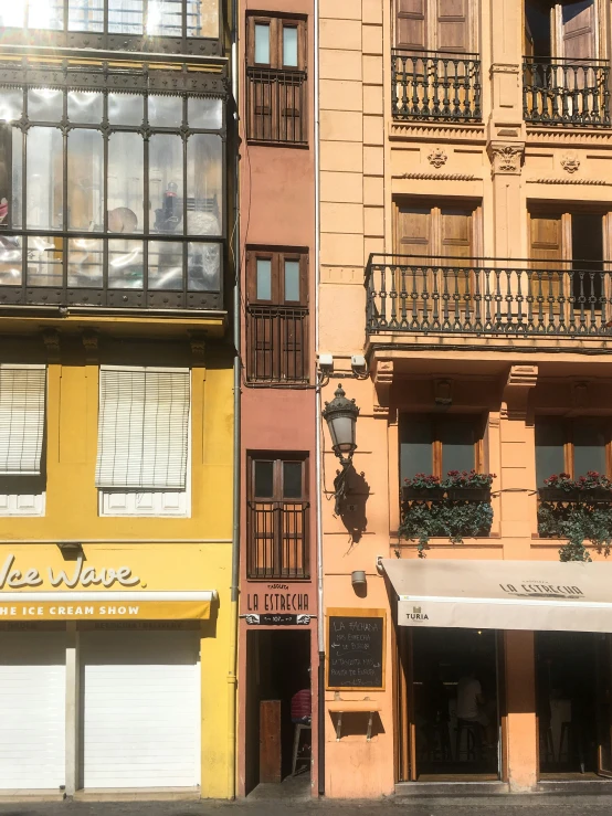 a store with open windows in the city