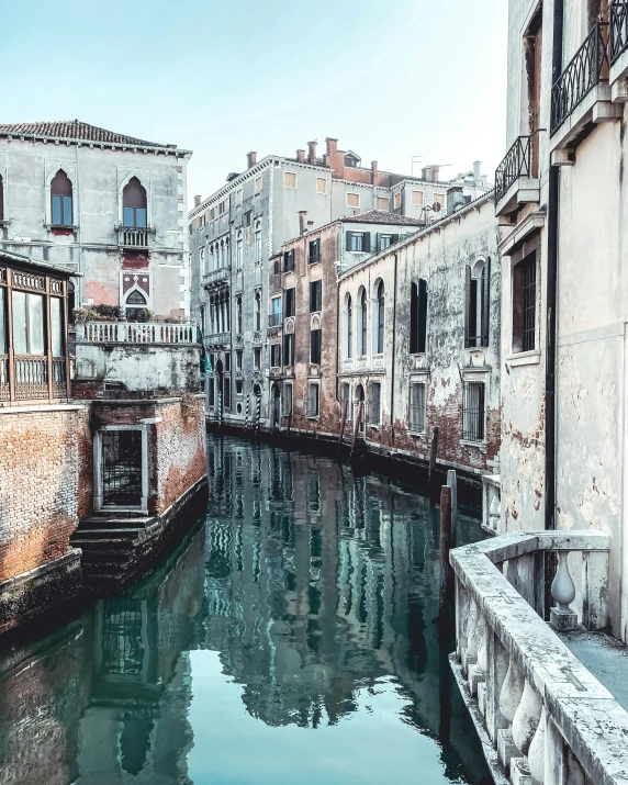 buildings in venice during winter and their reflections