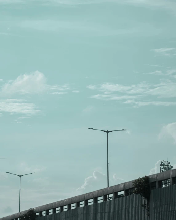 a high way train on a bridge with no vehicles