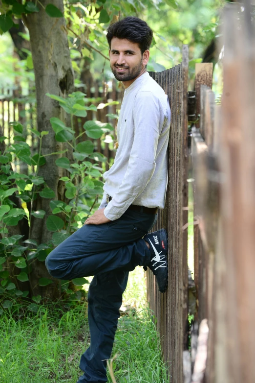 the young man is posing for a po