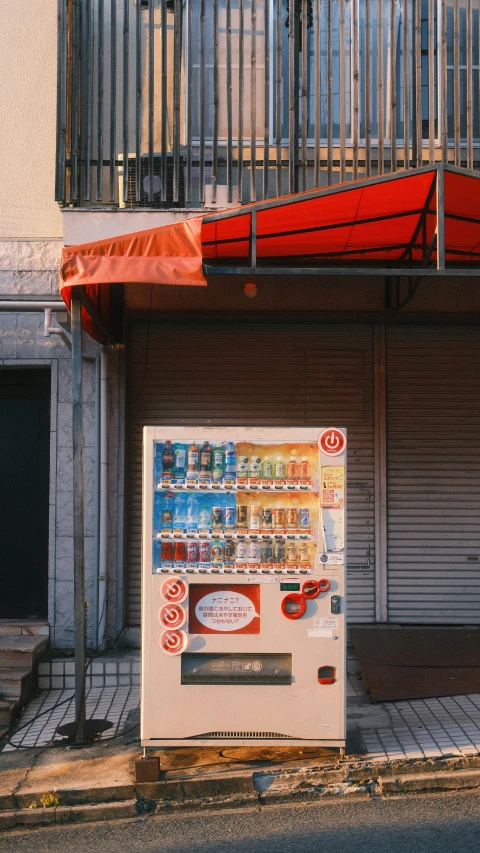 an ice cream machine is on the sidewalk