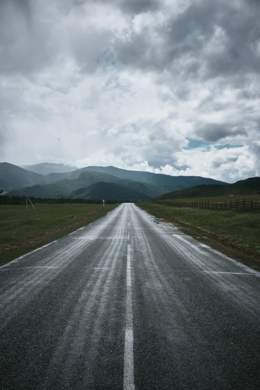 a empty road going into the distance in a rural area