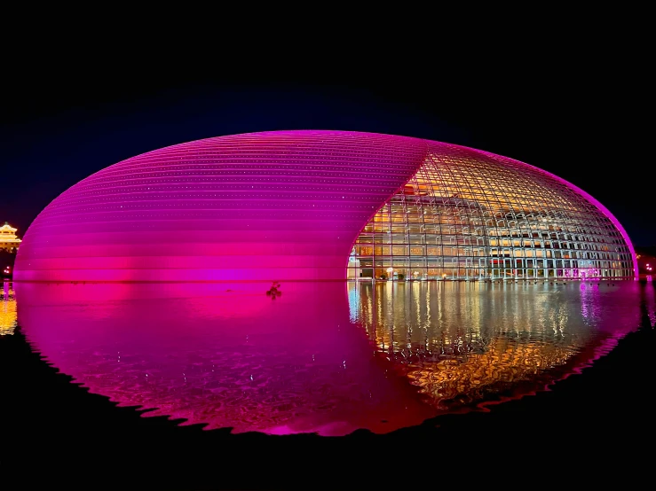 a colorful building with a giant dome in the middle