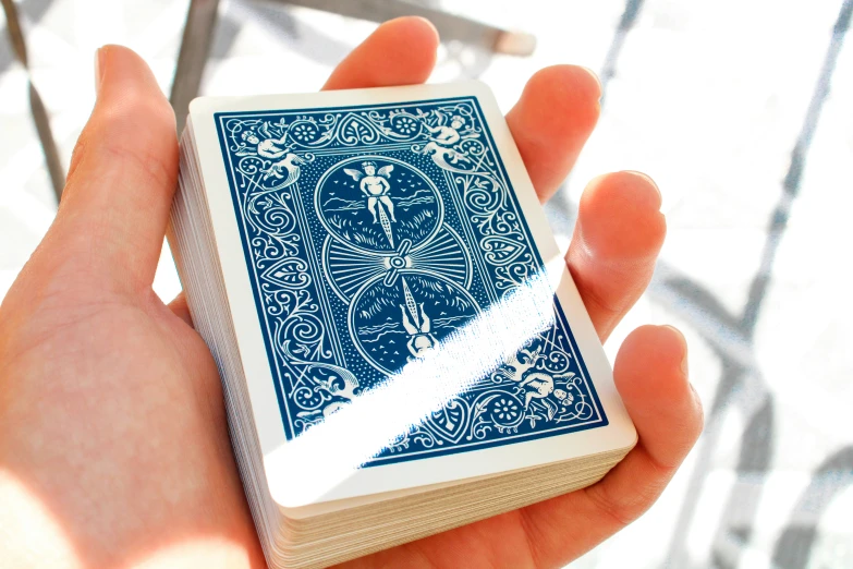 a person holding a card in their hand