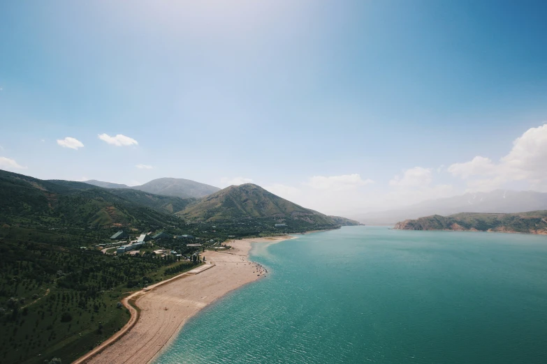 an aerial view of the water and beach