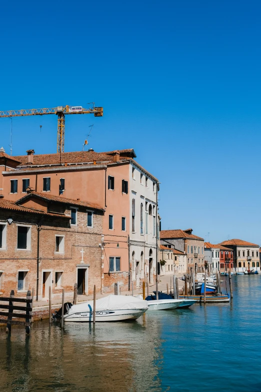 a couple of buildings on the side of the water