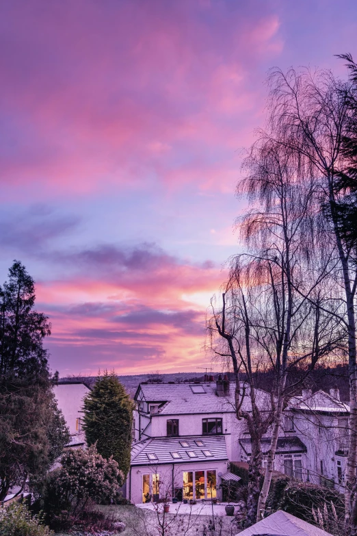 a purple and pink sky is shown in this pograph