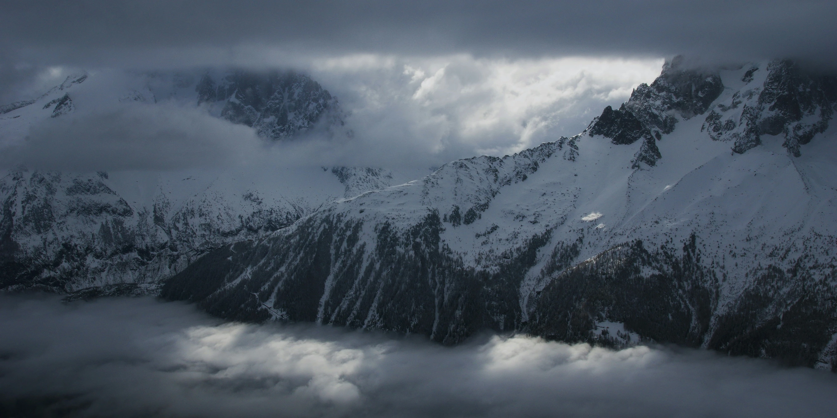 the snowy mountains were shredding with snow