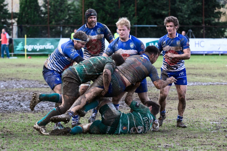 a group of men on a field playing a game