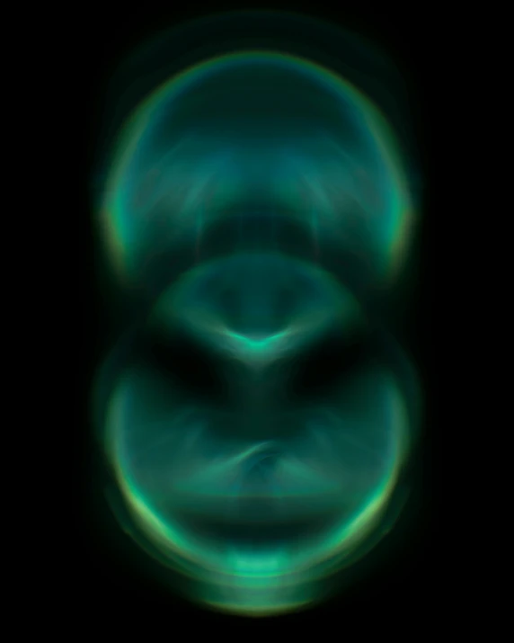 an abstract blue and green blurry circular image