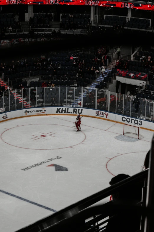 some hockey players playing a game at night