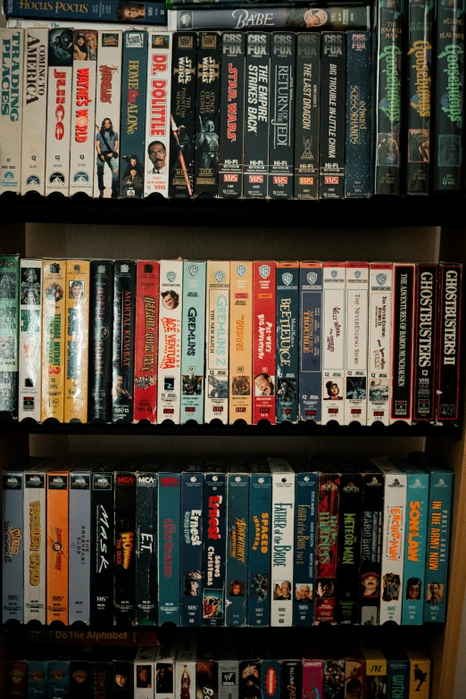 a shelf filled with assorted paperback books