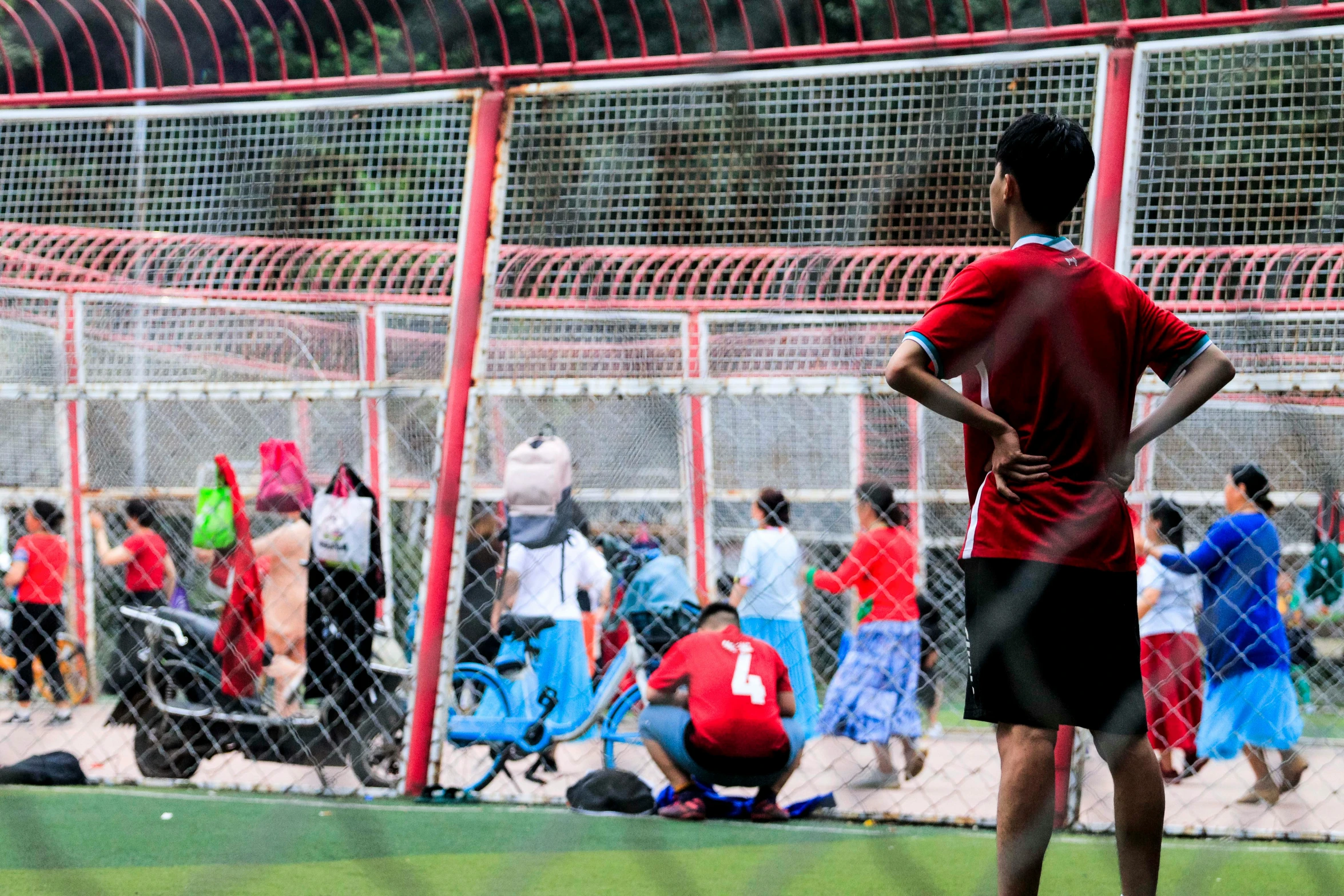 a man standing on top of a soccer field