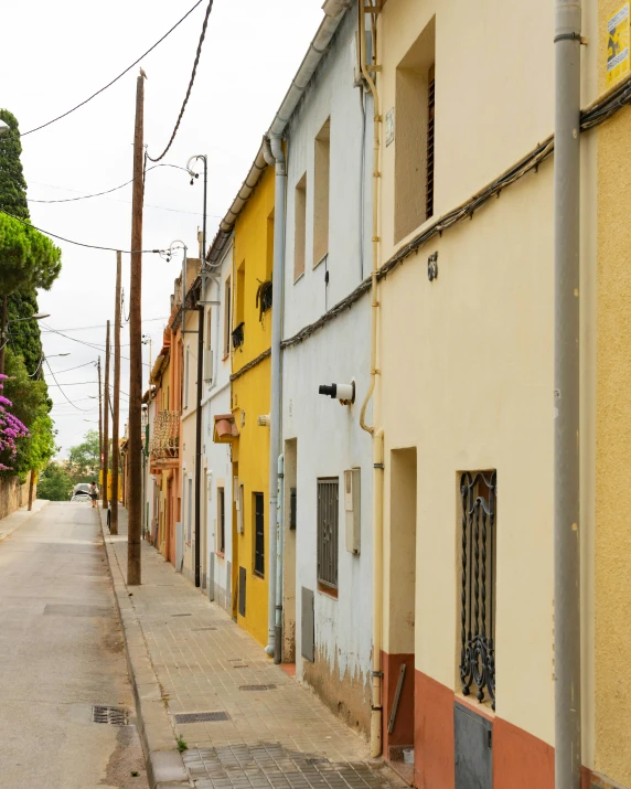 a group of buildings lining a city street