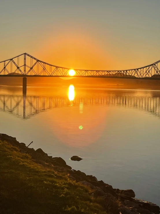 an image of a large bridge during sunset