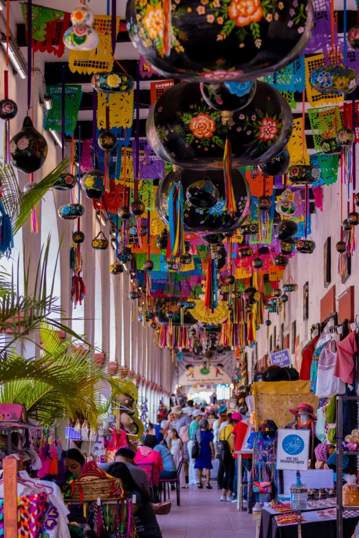 a big covered with lots of kites hanging from the ceiling