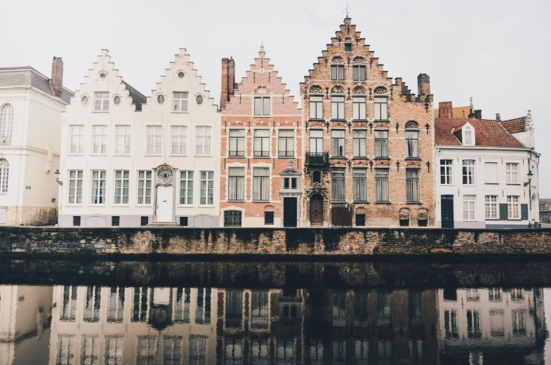 several buildings line the edge of the river