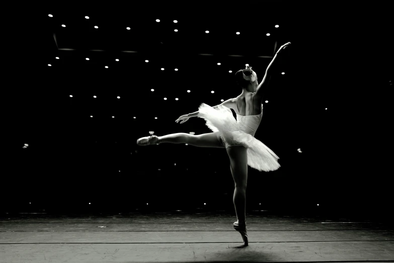 an image of a ballet dancer in the dark