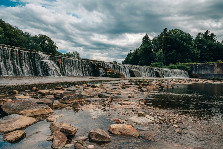 an image of a large waterfall in the distance