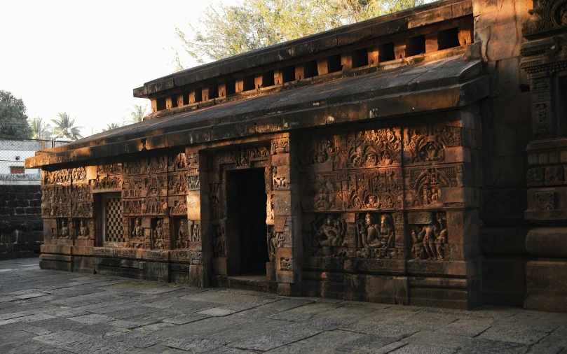 the building has a wooden door and two doorways