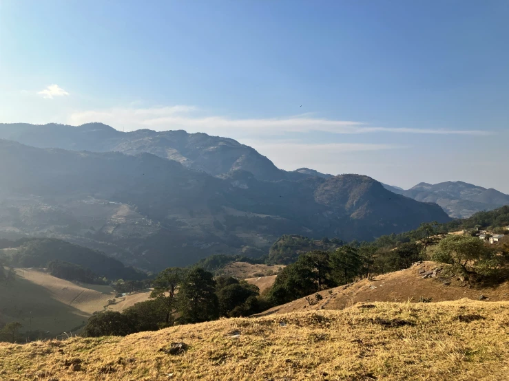 the view looking back toward the mountains from the top