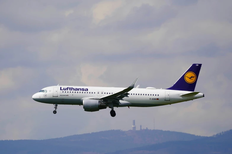 the lufthansa plane is taking off in to the sky