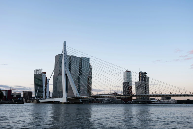 a body of water with buildings and bridges