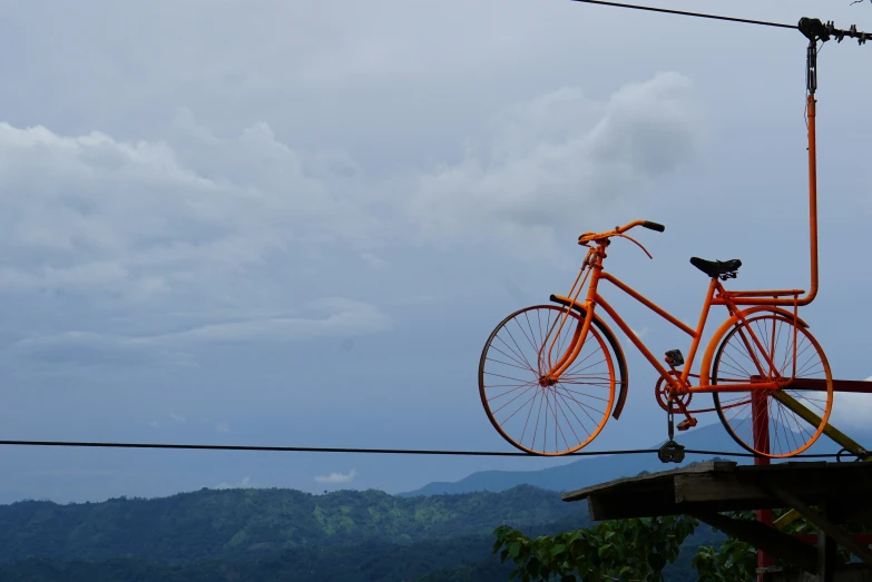 a bike that is sitting on a cable