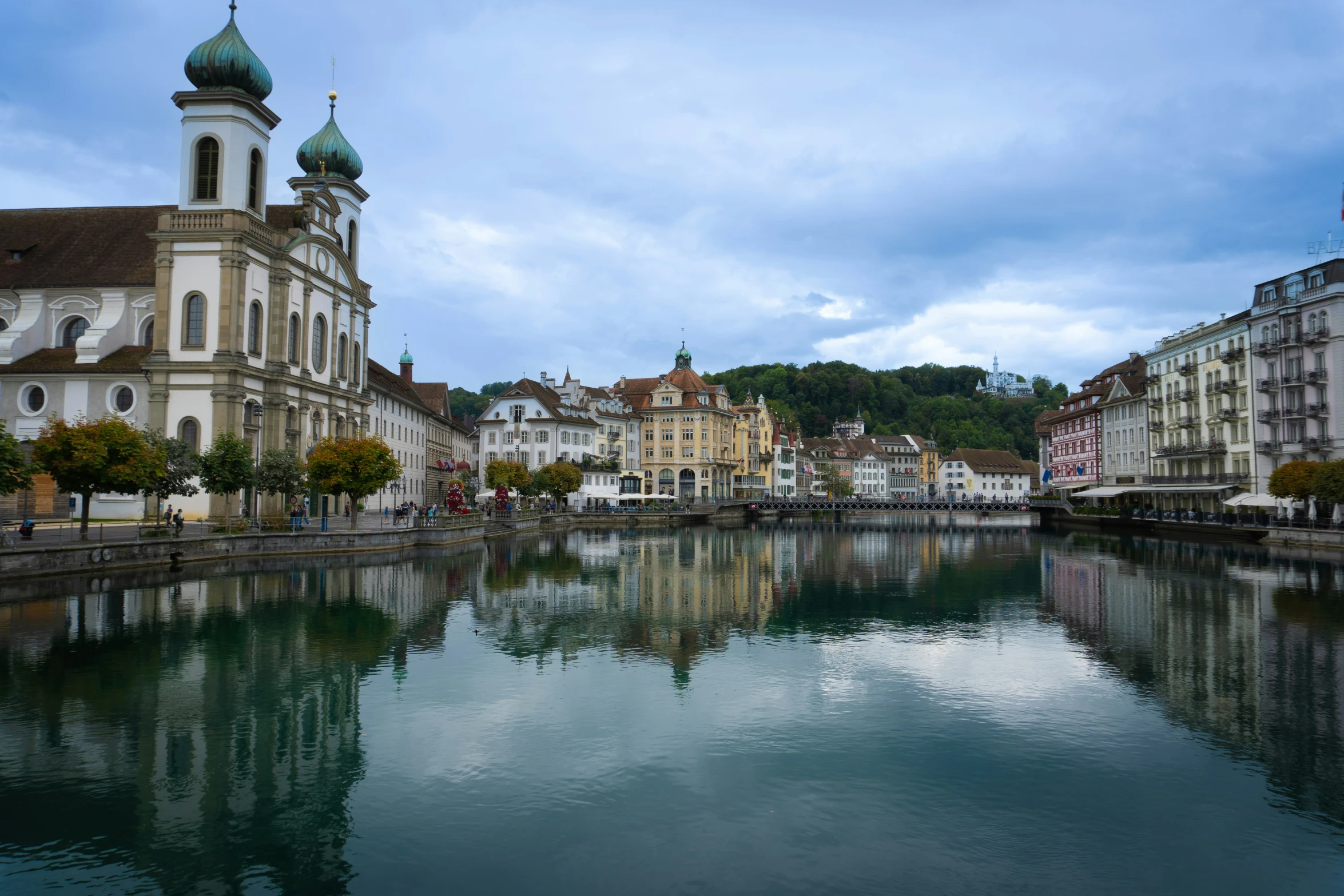 a river that is full of water near buildings