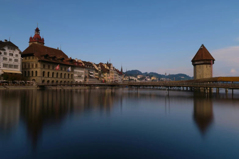 a town and bridge over a large body of water