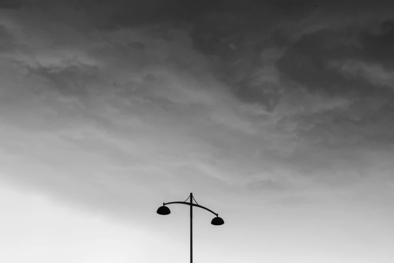 black and white po of sky with rain clouds